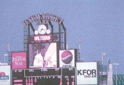 Mike on a jumbo screen